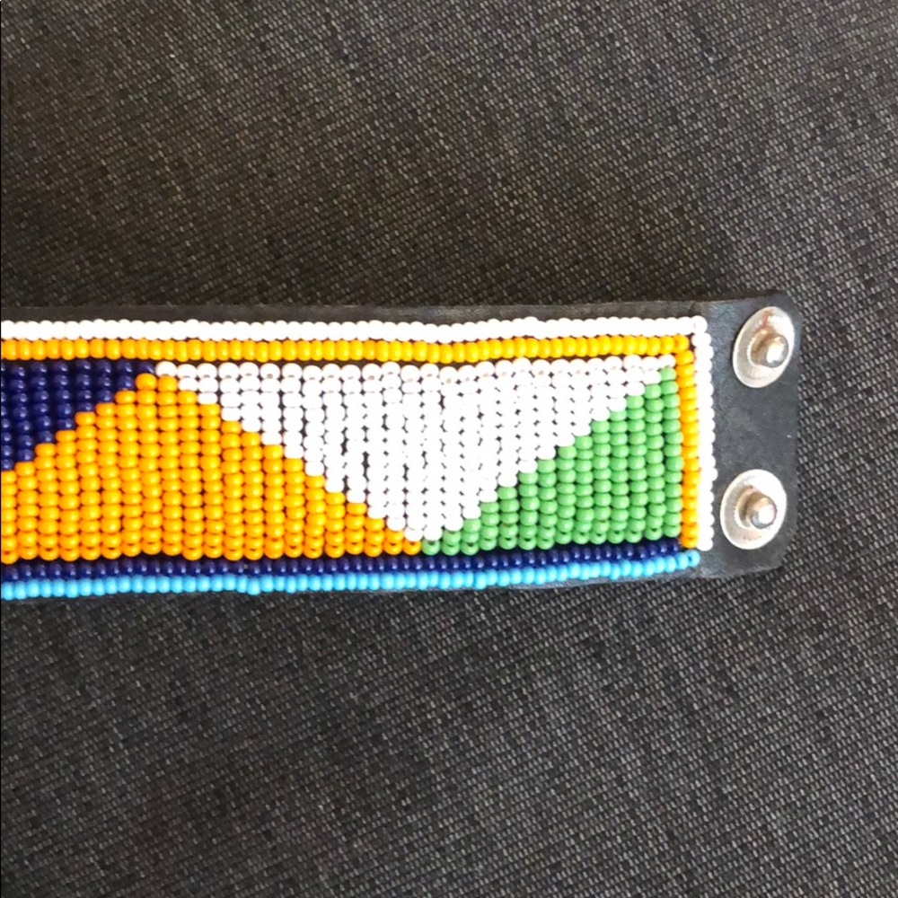 Beaded orange, blue, and white bracelet